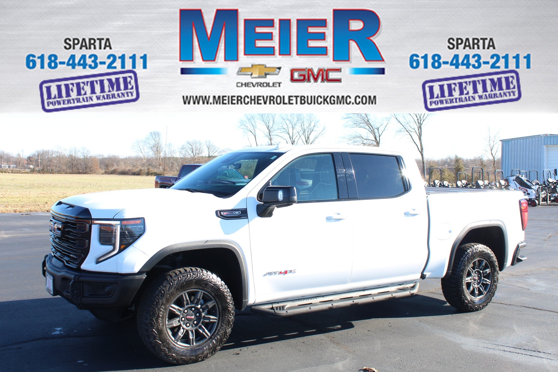 2024 GMC Sierra 1500 AT4X in Summit White — front three-quarter view